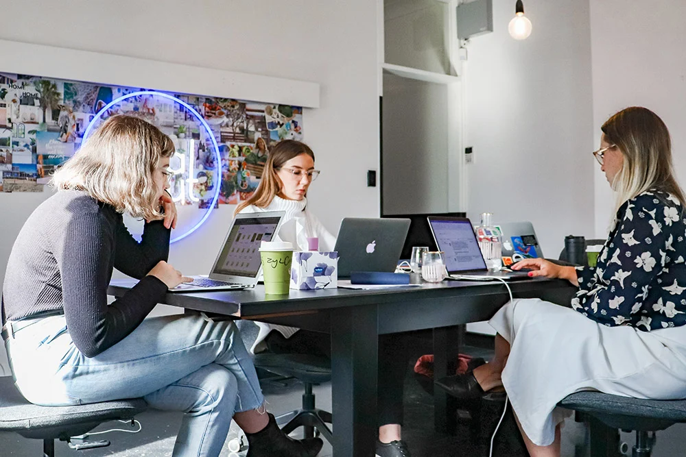 Digital marketing team working in an office.